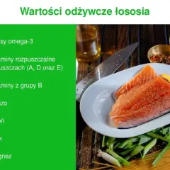Czy łosoś jest zdrowy? Tak, dzięki kwasom omega-3, witaminom i minerałom. Na talerzu świeży łosoś z cytryną i dodatkami.